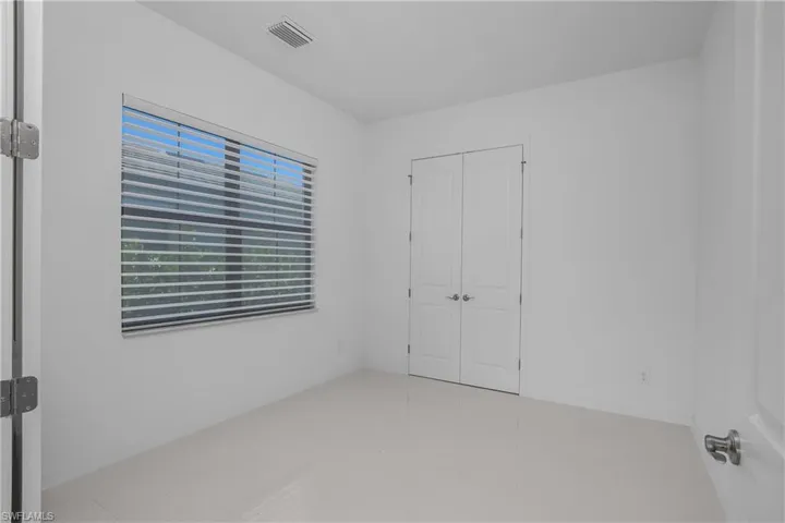 Third bedroom with a closet