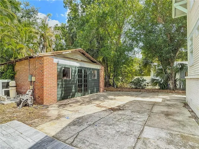 View of patio / terrace featuring an outbuilding