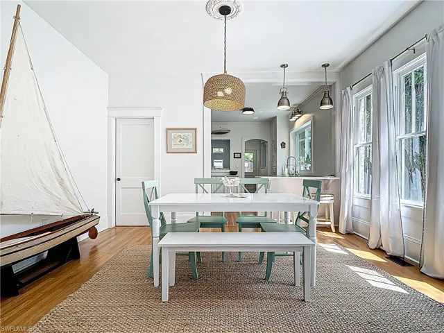 Dining area with wood finished floors