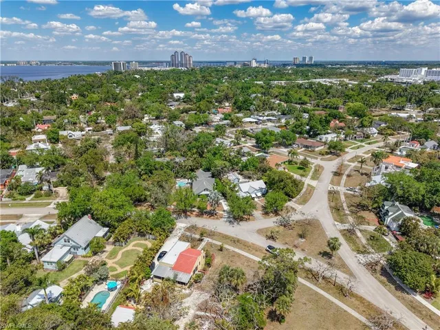 Bird's eye view with a city view and a water view