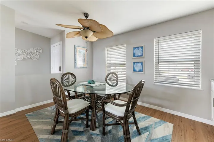 Dining room featuring ceiling fan and laminate wood finished floors