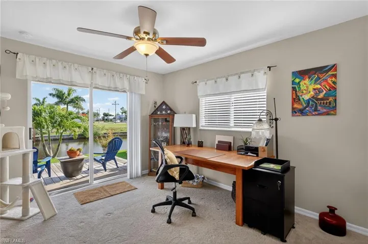 Interior room with sliding glass doors opening to an exterior deck