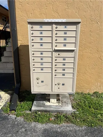 View of home's community featuring mail area
