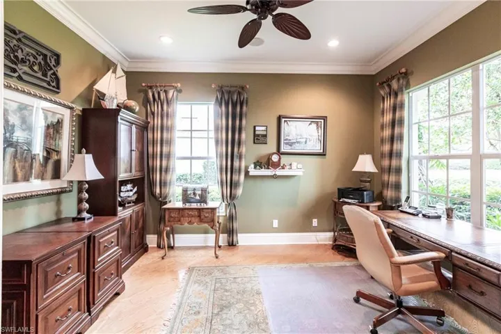 Office space featuring ornamental molding, a ceiling fan, light wood-style floors, and recessed lighting