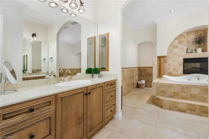 WITH ELECTRIC FIREPLACE AND HIS/HERS VANITIES