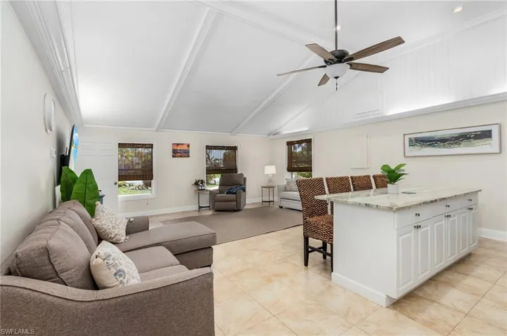 Living room featuring baseboards