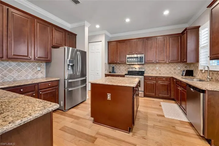 Oversized kitchen with lots of cabinet/counter space. perfecct for entertaining as the kitchen opens to the Great Room.