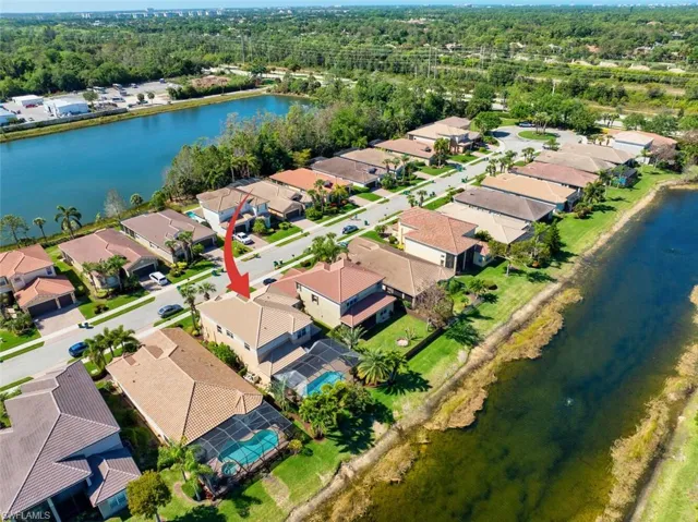 Situated perfectly on the lot overlooking a lake.