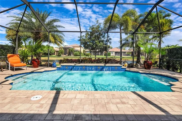 Custom private pool overlooking a lake.