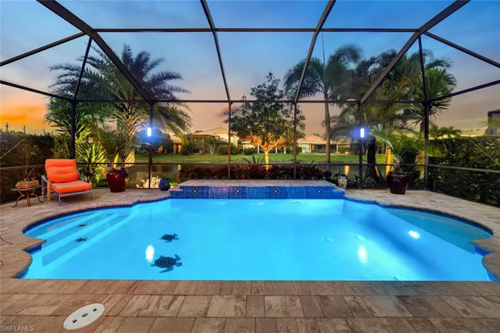 Evening view of the screened in custom pool area.