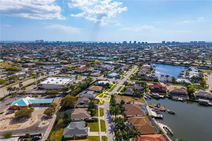 Birds eye view of property with a residential view, a water view, and a city view