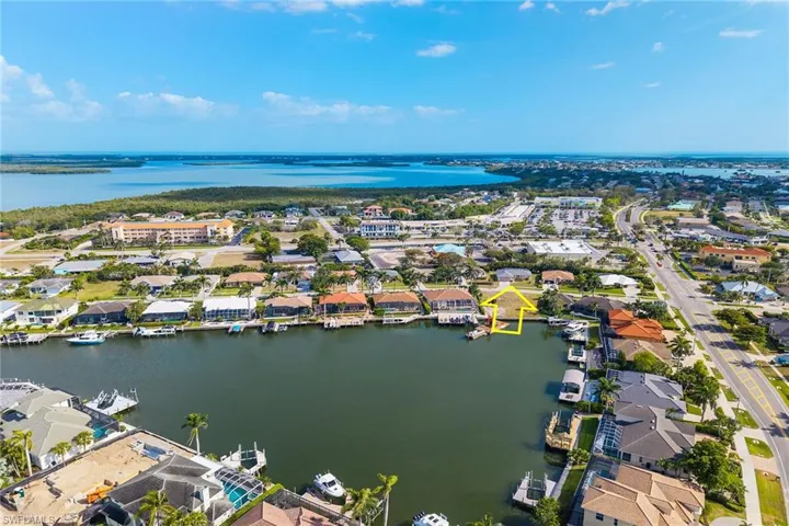 Bird's eye view with a residential view and a water view
