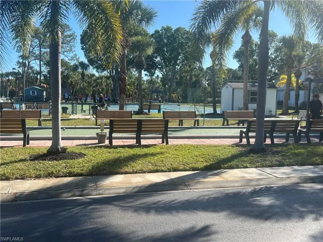 Surrounding community featuring a lawn