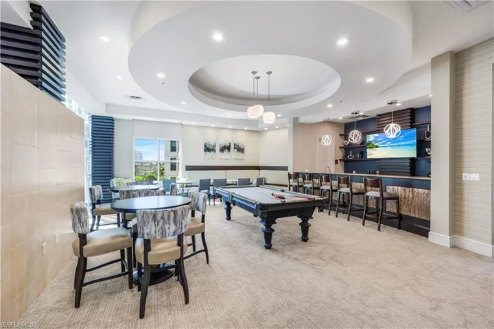 Rec room with billiards table, wet bar, and recessed lighting