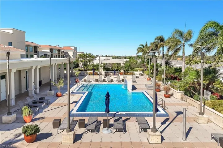 Community pool featuring a patio