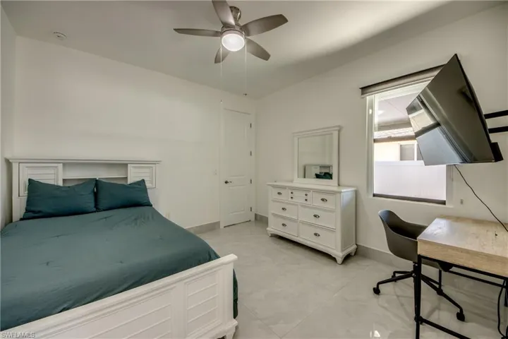 Bedroom featuring ceiling fan