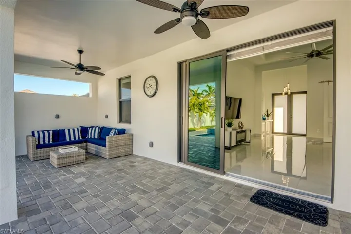 View of patio / terrace featuring an outdoor hangout area and ceiling fan