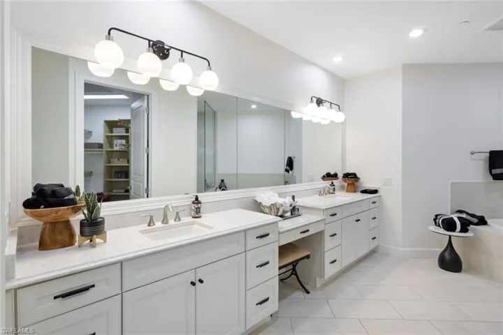 Primary Bathroom with sit down vanity
