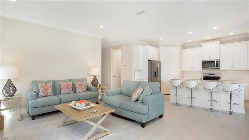 Living room with ornamental molding