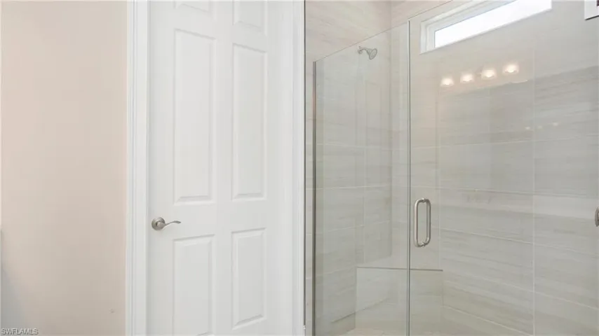 Bathroom featuring a shower stall