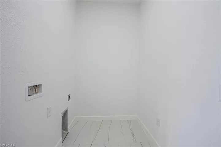 Laundry area featuring washer hookup and hookup for an electric dryer