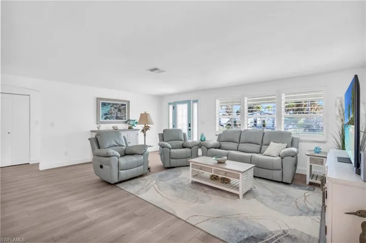 Living room and entry way - VIRTUALLY ENHANCED