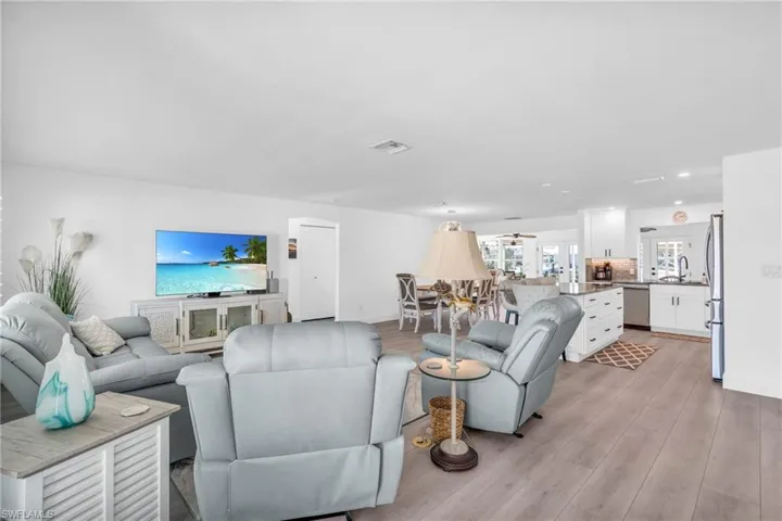 Living room and entry way - VIRTUALLY ENHANCED