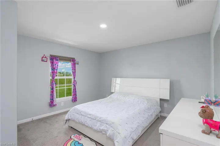 Bedroom featuring carpet flooring