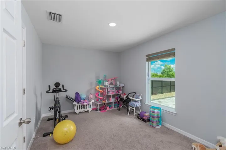 Rec room featuring carpet