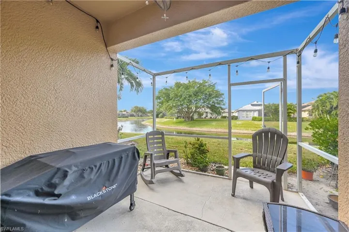View of patio / terrace with a water view