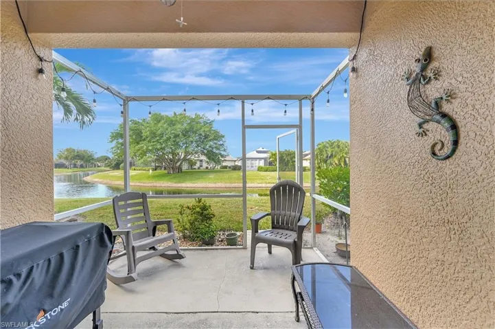 View of patio / terrace featuring a water view and a grill