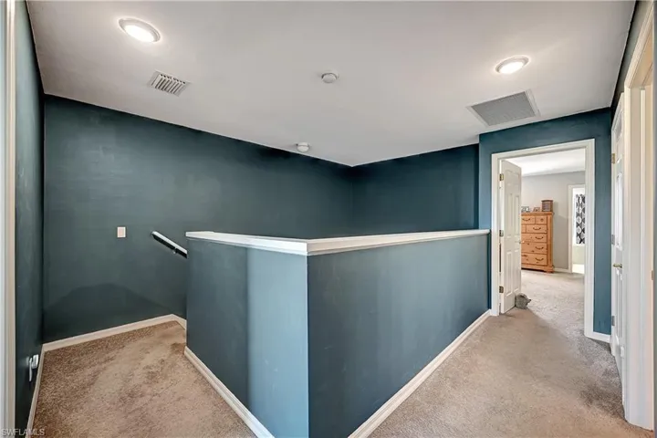Corridor with light carpet