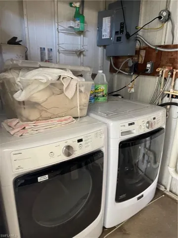 Washroom with electric panel and independent washer and dryer