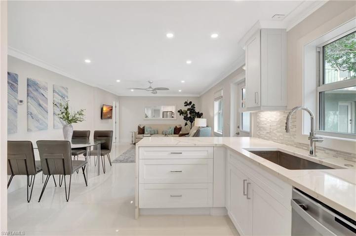 KITCHEN VIEW WITH A WINDOW OVER THE SINK