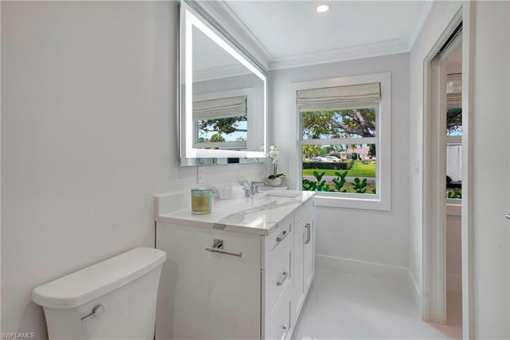 WINDOW IN MASTER BATH ALLOWING NATURAL LIGHT