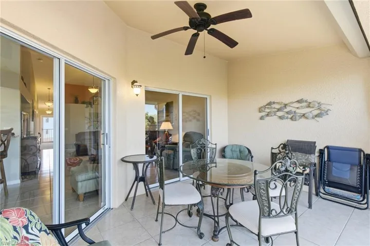 Tiled with ceiling fan, hurricane shutter and amazing lake view