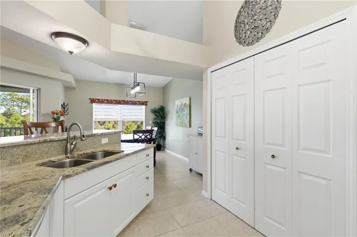 Laundry in kitchen as well as a large walk-in pantry