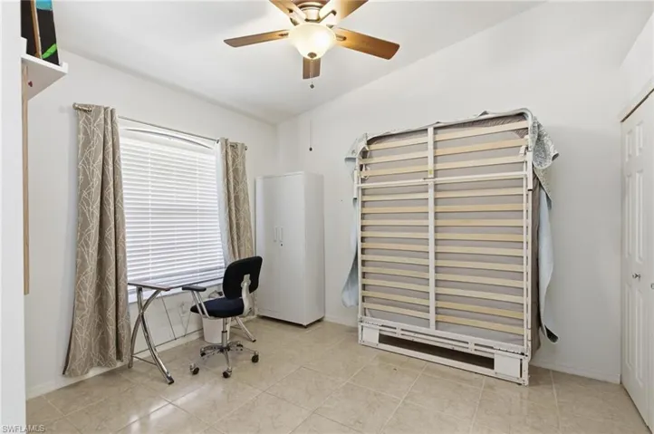 Guest Bedroom has murphy Bed to use space as a office or workplace