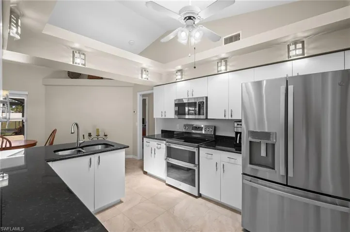 Kitchen with double oven and microwave
