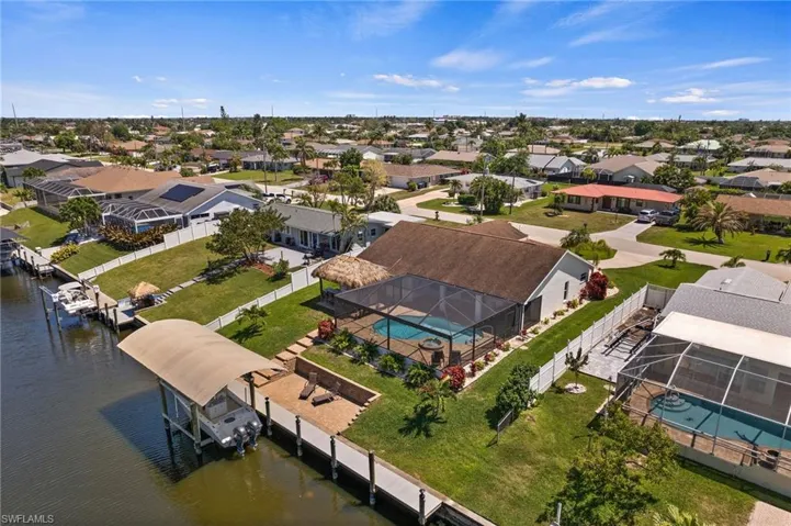 Arial view of the backyard and Gulf Access Canal