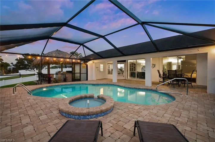 Pool, Lanai and Tiki in the Evening