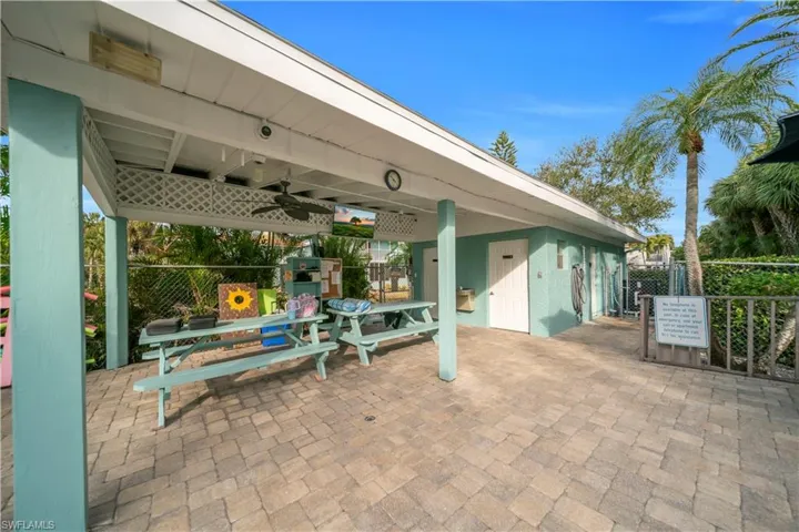 View of patio featuring ceiling fan