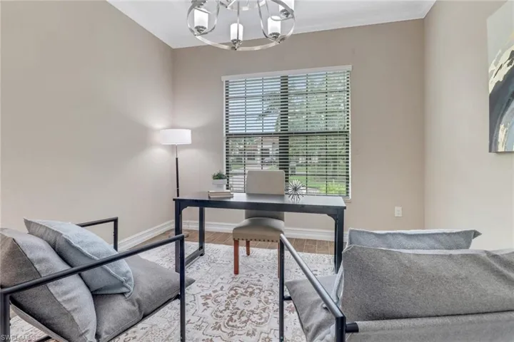 The natural light coming n from two sides creates an inviting setting to work from home.