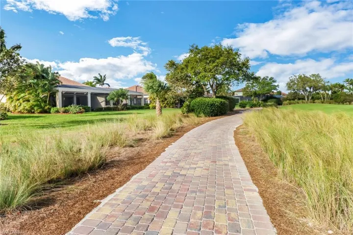 The golf path behind this home.