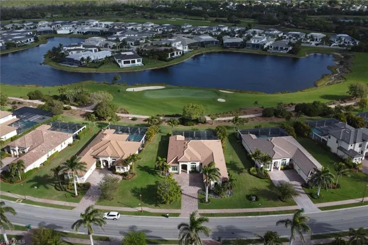Drone / aerial view featuring a residential view and a water view