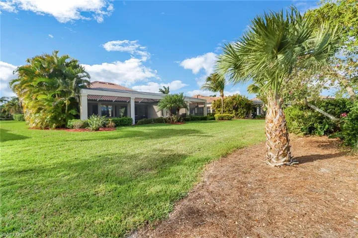 View of yard featuring a lanai