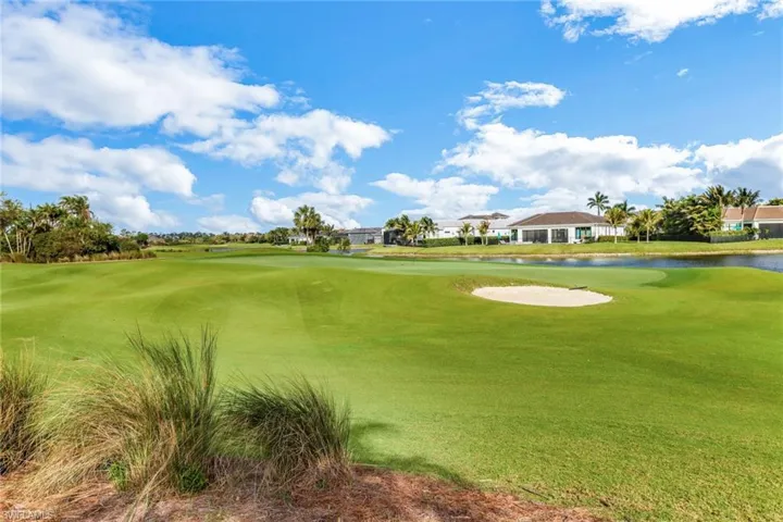 View of the TCP Treviso Bay golf course located directly behind the home,