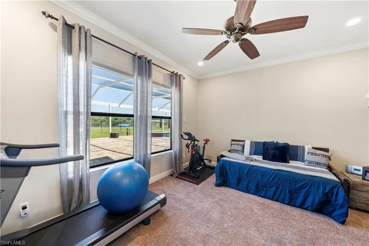 One of two bonus rooms located downstairs.  Perfect for home office, den, nursery, hobby room. Endless possibilities.