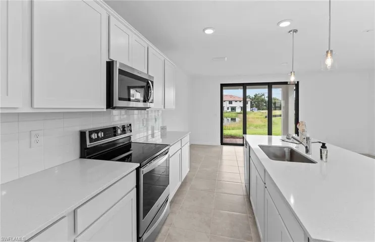 Interior photos are of a similar home - Same floor plan (Rowan)