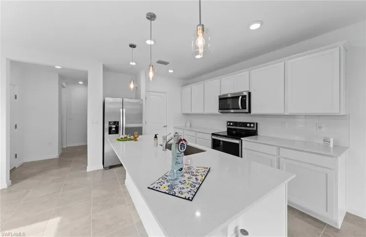 Interior photos are of a similar home - Same floor plan (Rowan)